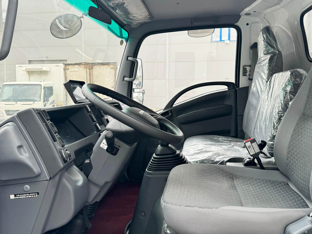 Isuzu тентованный 5,5 т., 5,6 м фото 5