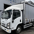 Бортовой тентованный грузовик ISUZU, 3,5 т фото 1